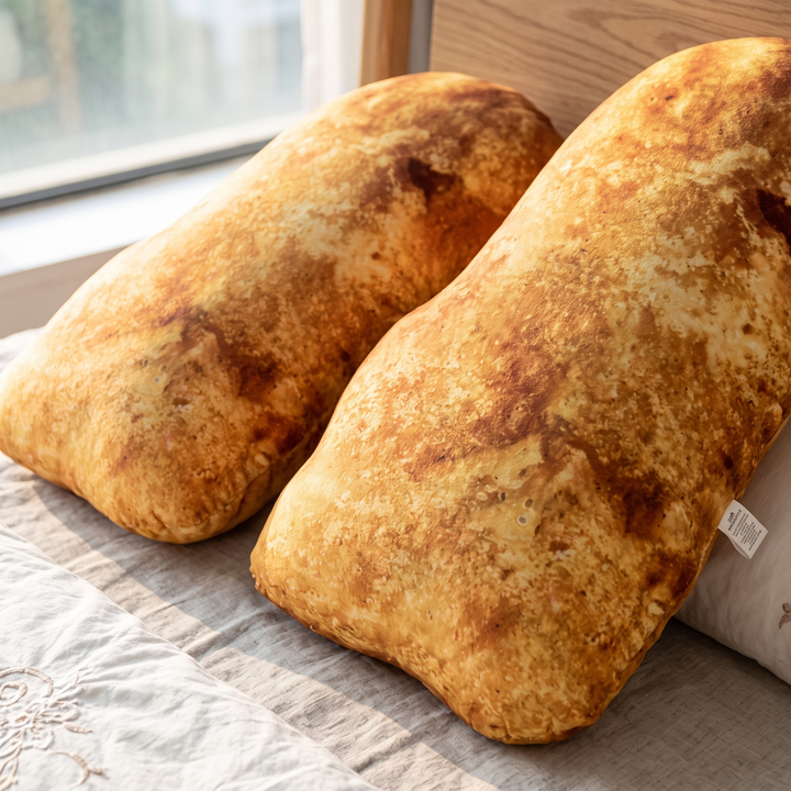 Person hugging the oversized Nugget body pillow for comfort